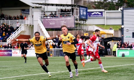 Maidstone United's Sam Corne (centre) celebrates alongside Liam Sole after scoring their side's first goal of the game from the penalty spot.