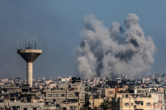 This picture taken on January 18, 2024 from Rafah shows smoke billowing over Khan Yunis in the southern Gaza Strip during Israeli bombardment, amid ongoing battles between Israel and the Palestinian militant group Hamas. (Photo by AFP) (Photo by -/AFP via Getty Images)