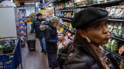 People shopping at a supermarket in Brooklyn, New York