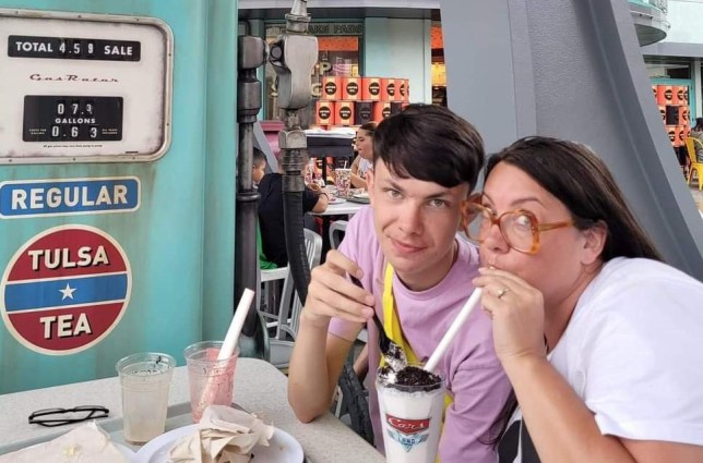 Kellie Whitehead sharing a milkshake with her son, James