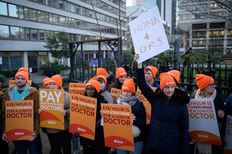 Junior doctors on a picket line this morning outside St Thomas' hospital in London.