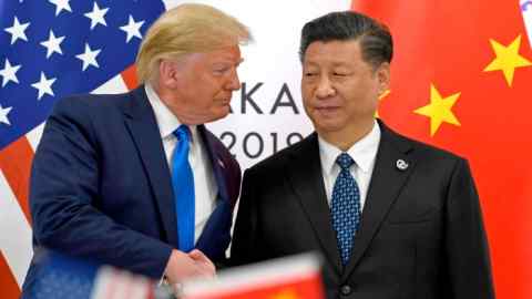 Donald Trump shakes hands with Chinese President Xi Jinping during a meeting while he was US leader on the sidelines of the 2019 G20 summit in Osaka