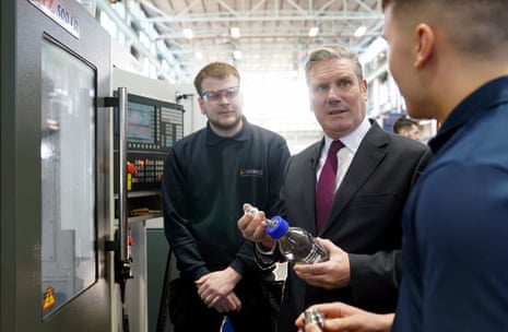 Keir Starmer speaks to two students at Warwick University