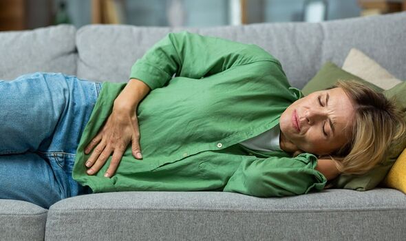 Woman with stomach pain