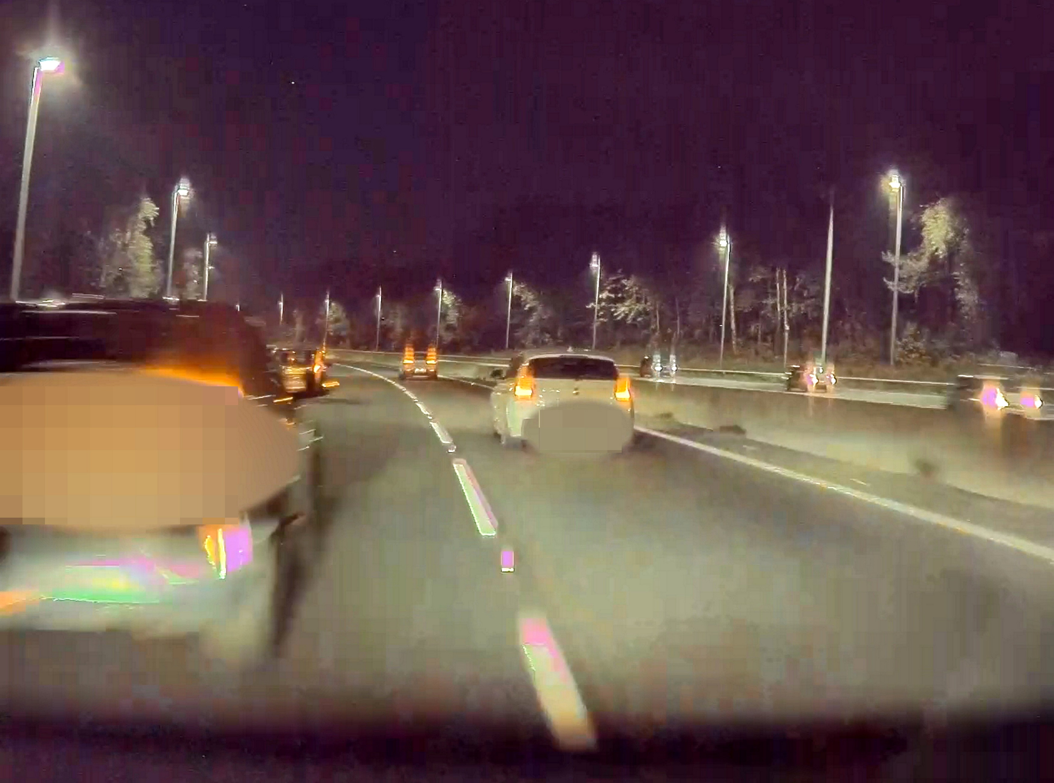 Herjean, driving erratically, overtakes a car in the middle lane, but crashes into the BMW in the right-hand lane