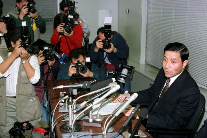 Shigeoki Togo addressing a press conference