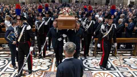 Pallbearers carry the coffin of Italy’s former PM Silvio Berlusconi