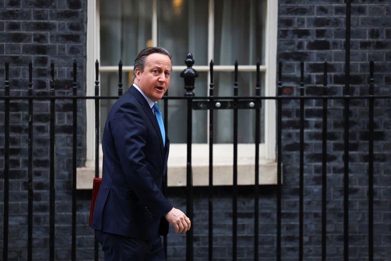 UK's Cameron heads to Germany for talks on Ukraine, Gaza