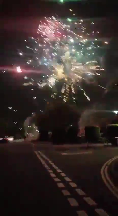 Fans set off fireworks outside what they thought was the City team hotel on Monday night