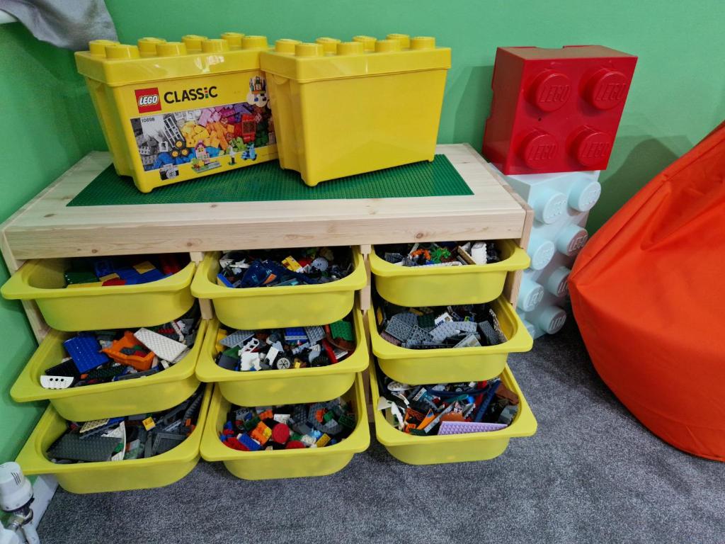 There are boxes of Lego in the house for children to play with