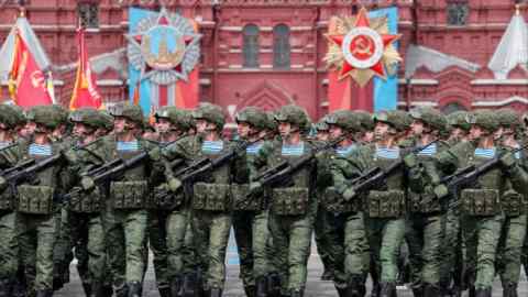 Russian servicemen march in the Victory Day military parade on Red Square in Moscow