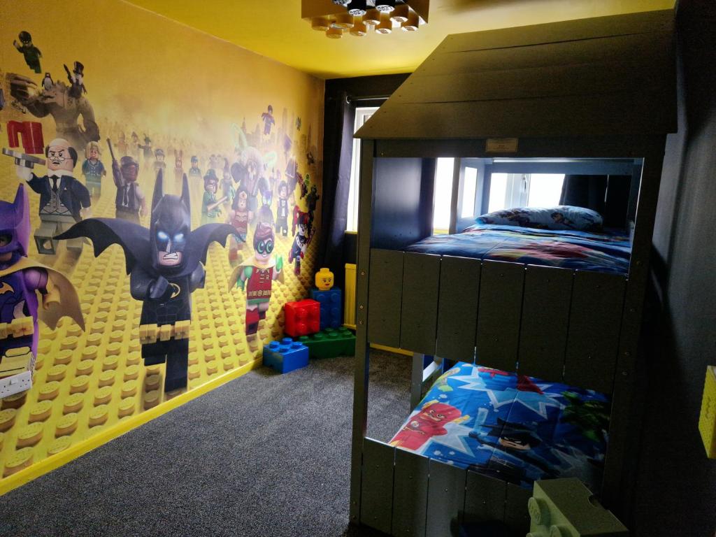 The Lego Batcave bedroom is based around Lego Batman