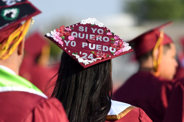 Jocdelyn Pantaleon’s decorated cap says, if I want, I can,...