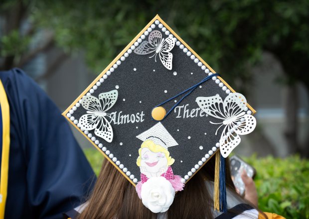 A Carter High School graduate’s cap shares her message with...