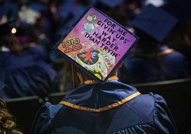 A decorated grad cap is seen Monday, April 22, 2024,...