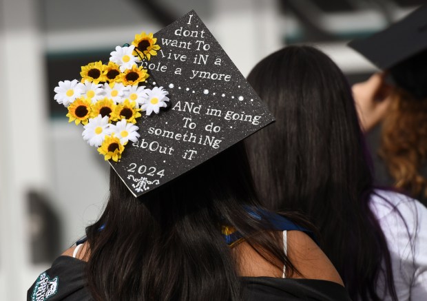 April Gutierrez’ decorated cap before Canyon Springs High School commencement...