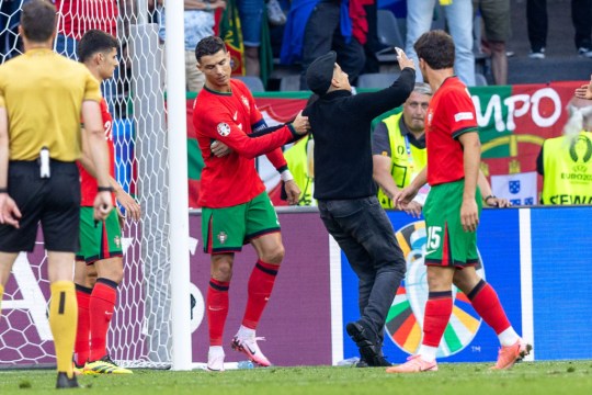 Cristiano Ronaldo is frustrated by another fan who wants to take a picture with him