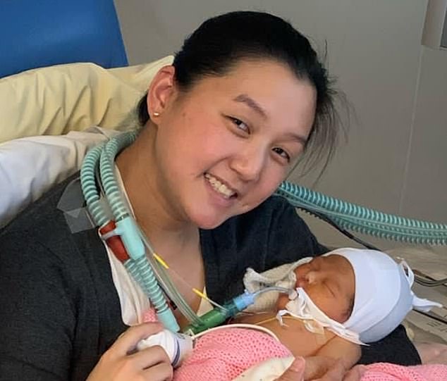 Baby Amelia with her mother Hui-Zhi being treated in hopsital