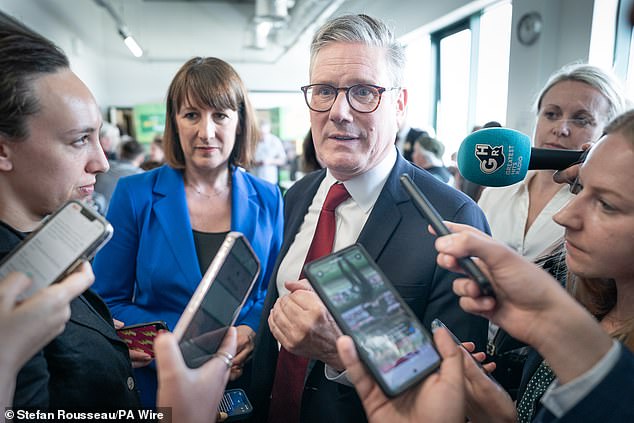 Starmer and Reeves face questions from journalists during a visit to Morrisons in Swindon where they met shoppers and discussed the cost of living with employees this month