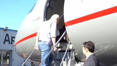 Julian Assange boards flight after release from prison, according to WikiLeaks video – video