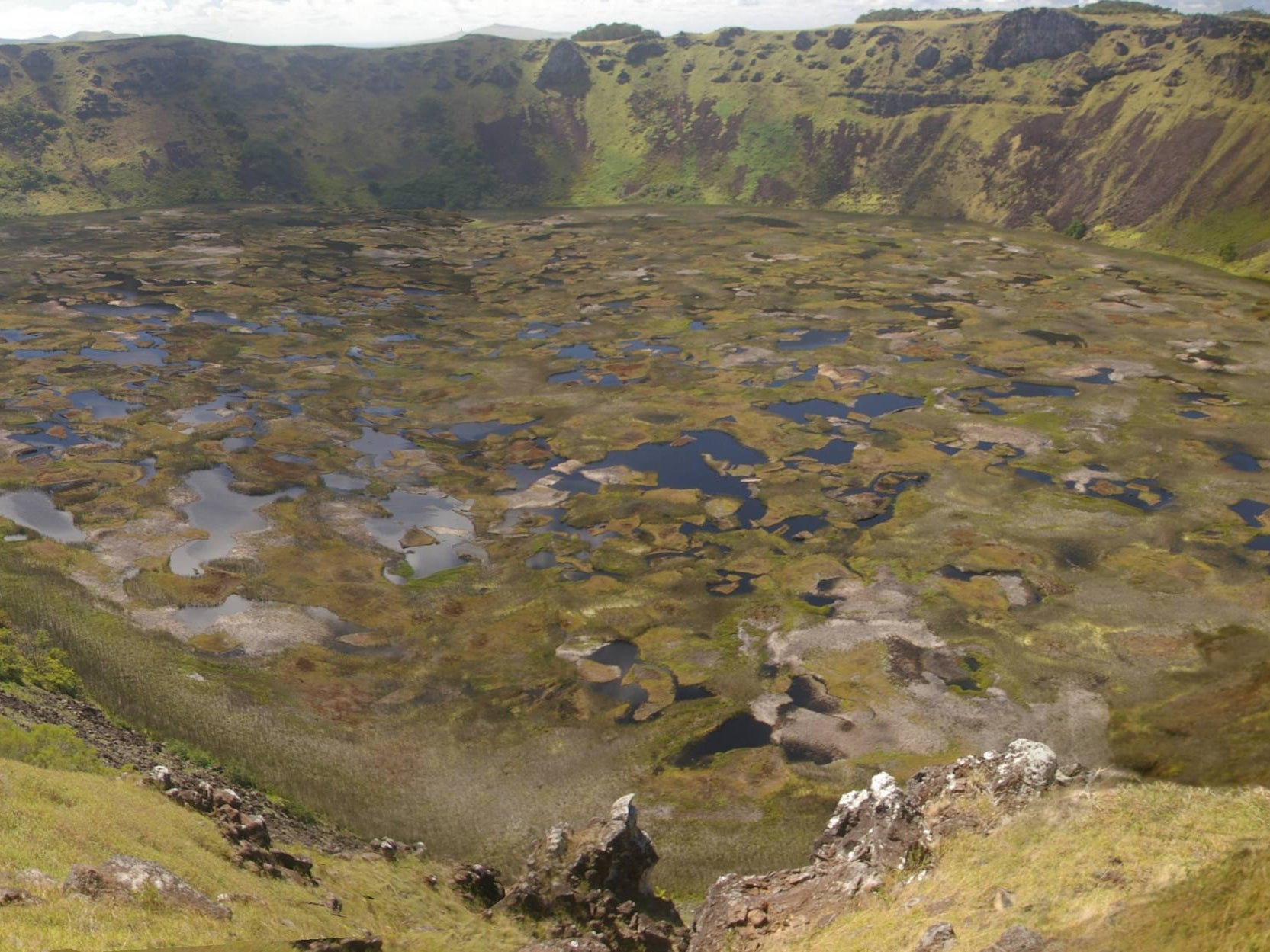 Easter Island is of volcanic origin. It was from the outer slopes of this massive volcanic crater that the people of Easter Island obtained much of the rock to make their giant statues