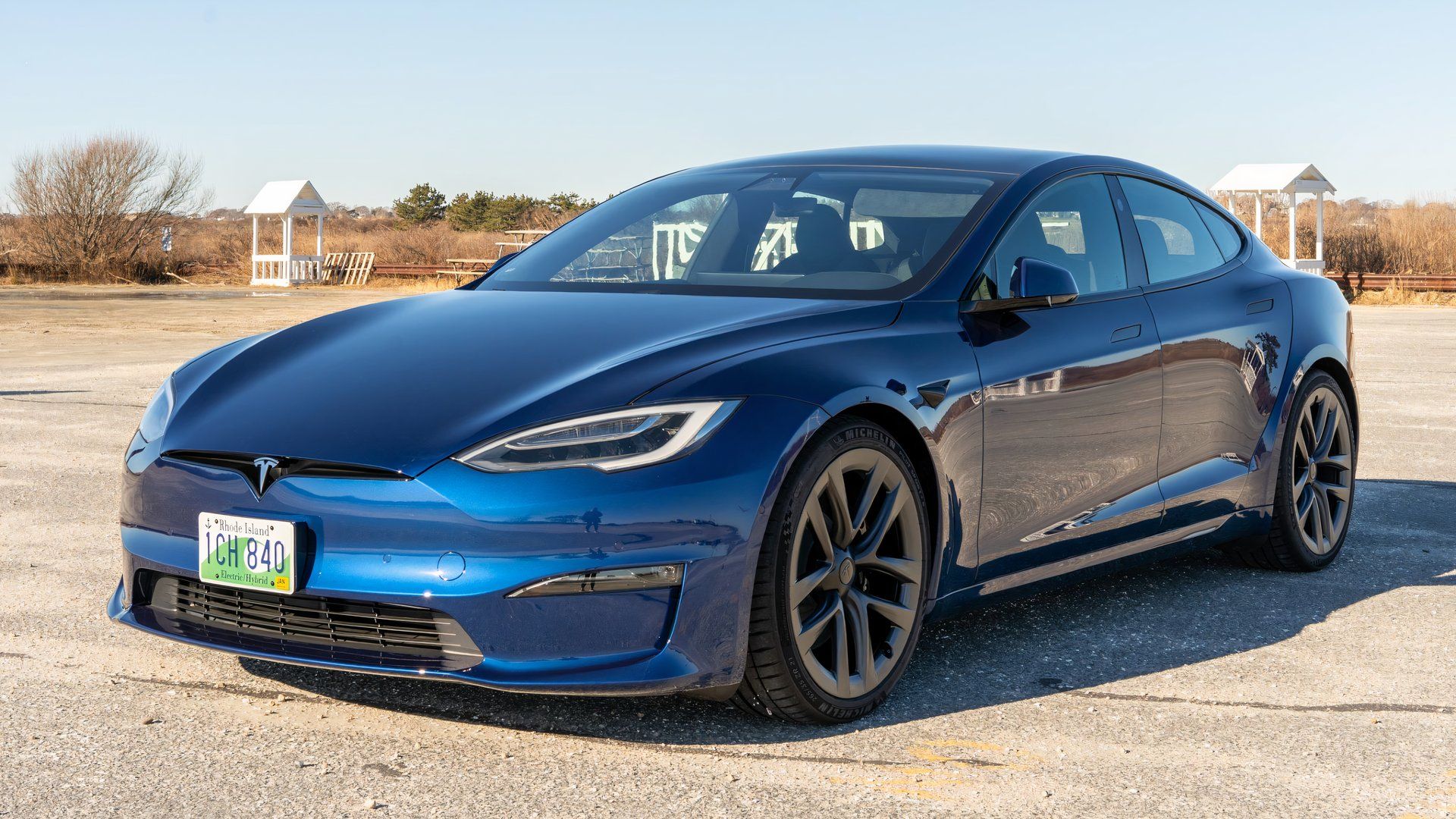 Front three-quarters shot of a blue 2021 Tesla Model S Plaid