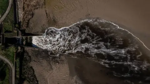 Getty Images An aerial view of sewage discharge flowing into the River Thames at Crossness sewage treatment works in 2024