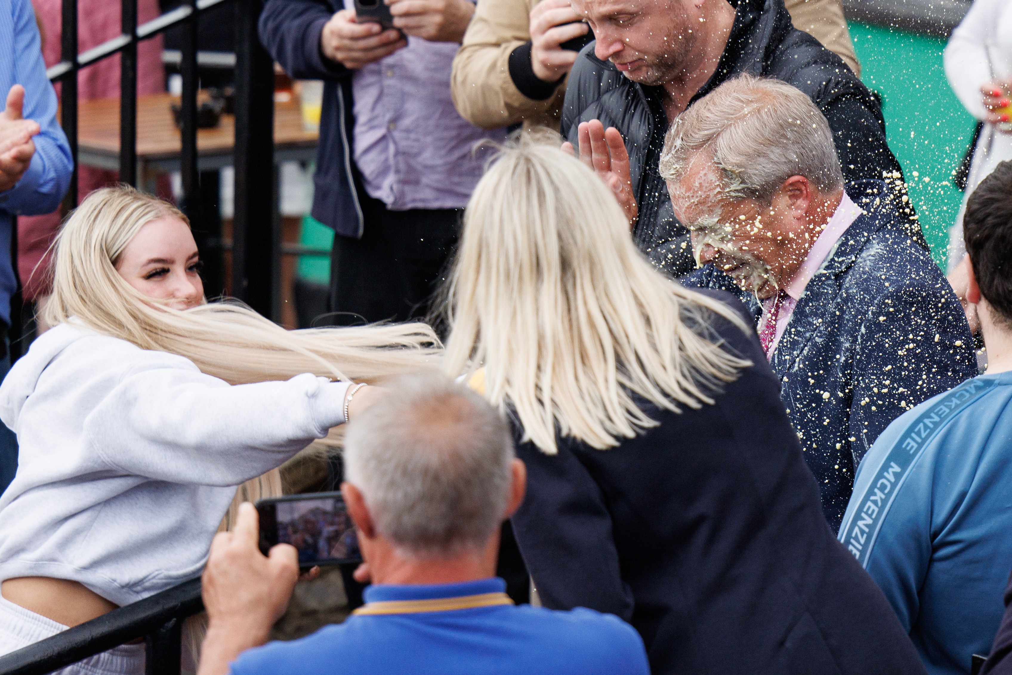 A Clacton woman lobbed a milkshake in Nigel Farage's face