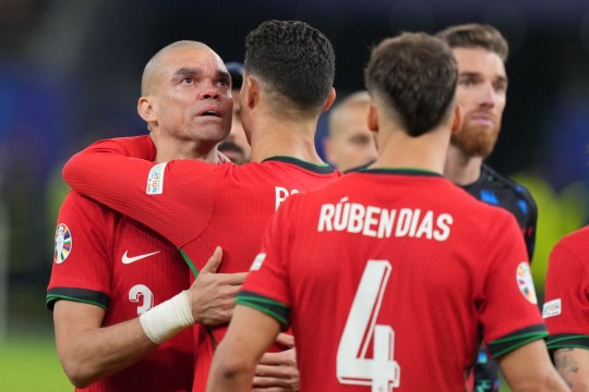 Pepe hugs Cristiano Ronaldo