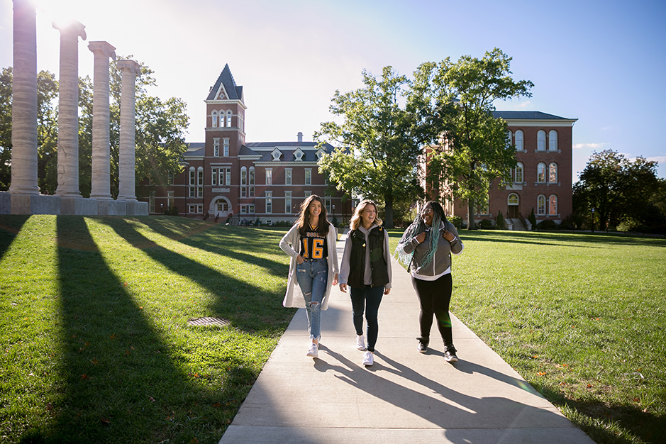 Students with Lafferre in the background