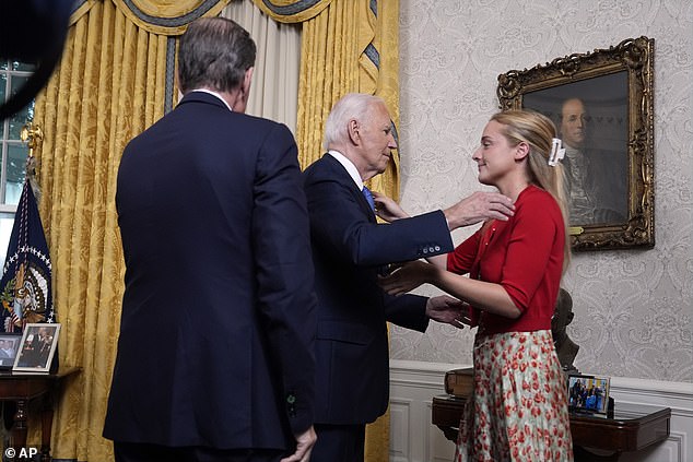 Biden comes in to hug his granddaughter Finnegan Biden as Hunter Biden watches after addressing the nation from the Oval Office of the White House