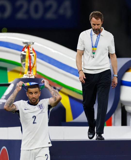 England manager Gareth Southgate and Kyle Walker look dejected after collecting their runners up medals 