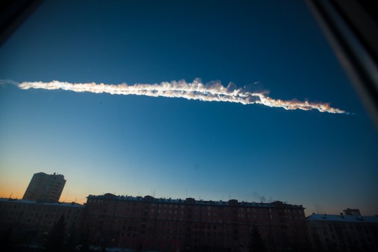 A meteorite contrail is seen over Chelyabinsk on February 15 2013 