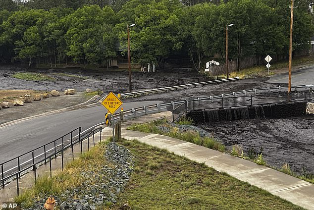 The town experienced another flash flood over the weekend when the National Guarded reported it had rescued or evacuated at least 12 people and two dogs,