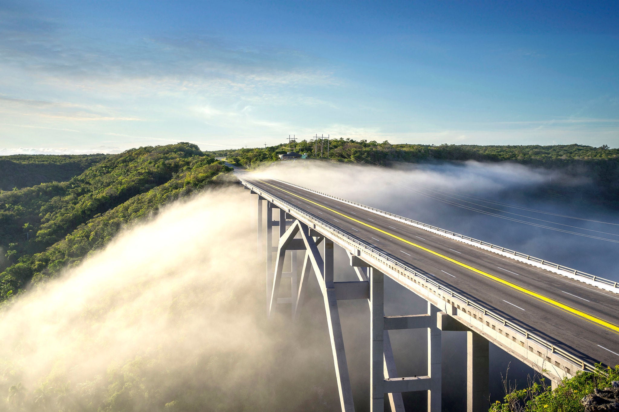 Morning mist below the Bacunayagua Bridge, the modern bridge bordering Havana and Matanzas province in Cuba