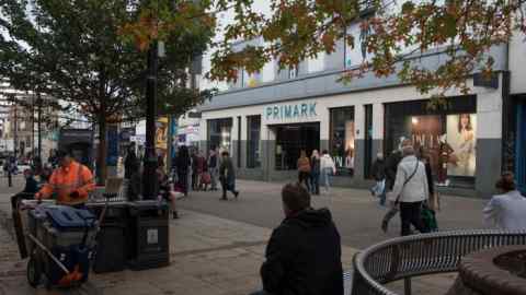 Pedestrians outside a branch of Primark in Romford, east London