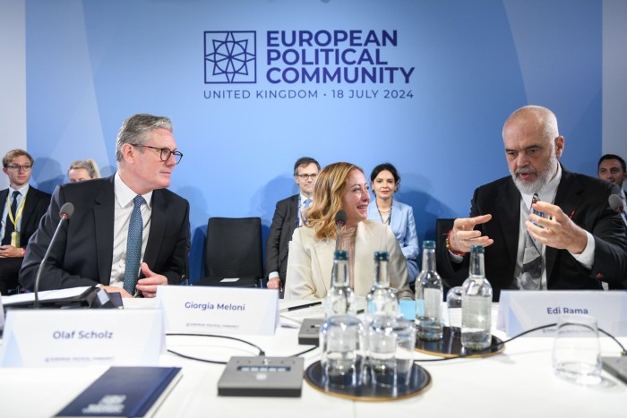 British Prime Minister Starmer, left, Italian Prime Minister Giorgia Meloni, centre, and Albanian Prime Minister Edi Rama, right, attend the Migration Working Group session