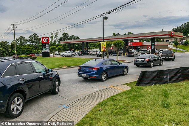 The five-day disruption caused localized shortages of gasoline, diesel fuel and jet fuel, which led to panic-buying as consumers feared gas would run out. Picture shows a long line at a gas station in Georgia