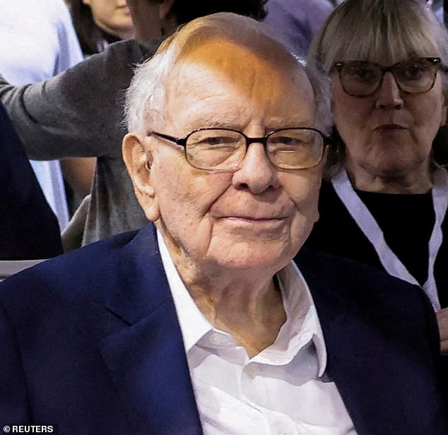 Apple's share price also dipped after billionaire investor Warren Buffett slashed his stake in the iPhone maker by more than $50billion (£39billion)