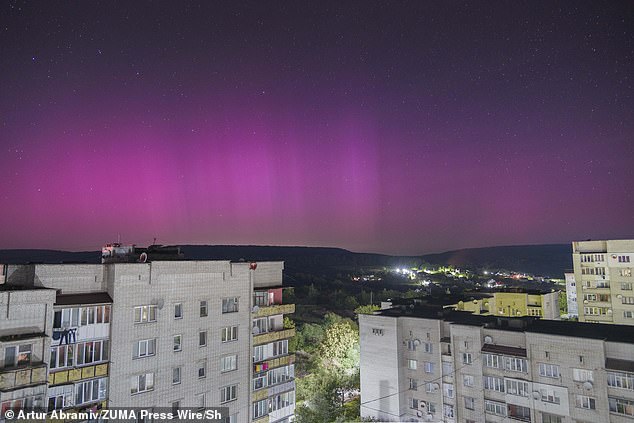 The lights stretched as far south over Europe as the town of Lviv in Ukraine (pictured) where the glow was visible despite city lights