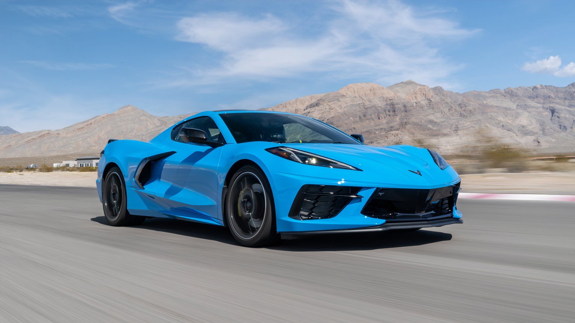 2020 Chevrolet Corvette Stingray blue driving on a track