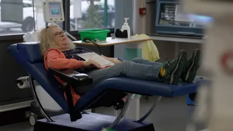 Jenny gives blood at a Manchester donation centre