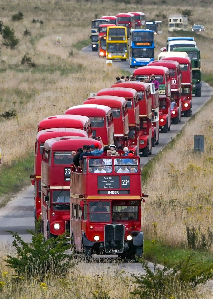 The colourful, old tour buses packed with visitors