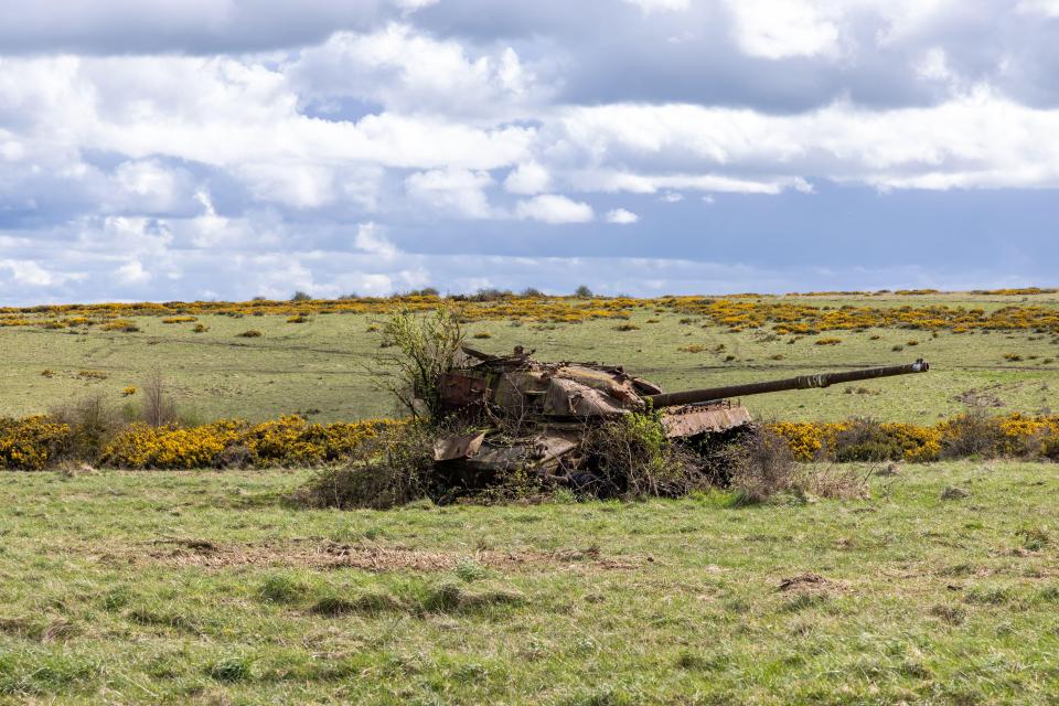 Ah ambandoned tank in a field