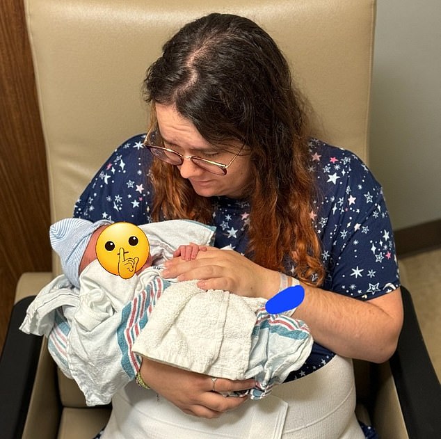 She is pictured above holding her son, who has not been named. She says her transition is affecting not only her, but also her now two-month-old boy