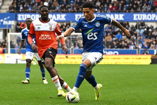 Lorient's French midfielder Ayman Kari (L) fights for the ball with Strasbourg's Brazilian forward Angelo Gabriel during the French L1 football match between RC Strasbourg Alsace and FC Lorient at the Stade de la Meinau in Strasbourg, eastern Franc