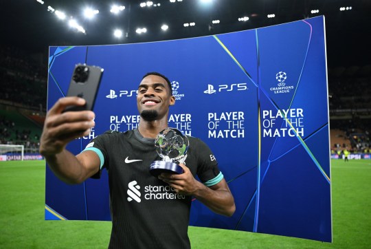 Ryan Gravenberch of Liverpool poses for a selfie with the Player Of The Match award following the team's victory during the UEFA Champions League 2024/25 League Phase MD1 match between AC Milan and Liverpool FC at Stadio San Siro on September 17, 2024 in Milan, Italy