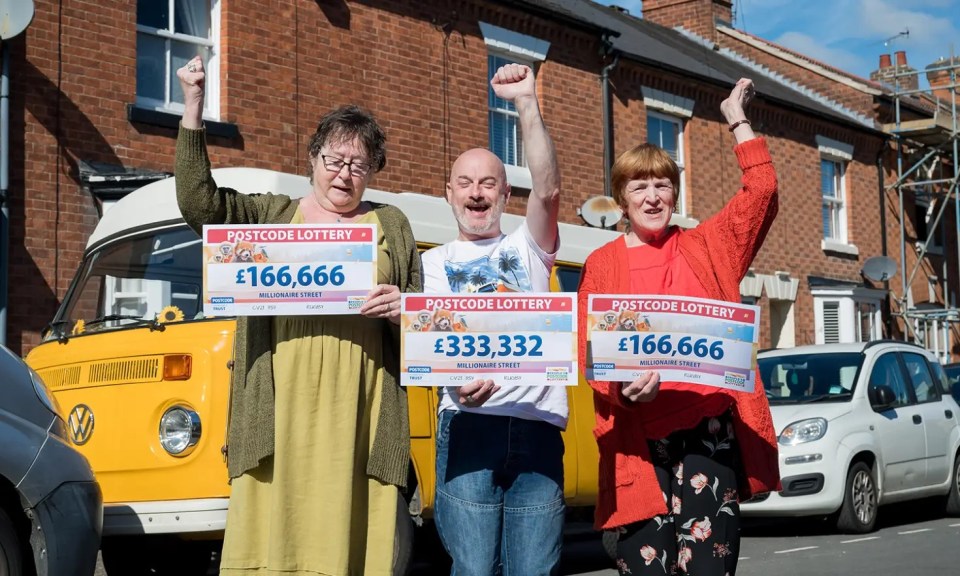 Adrian celebrates with his neighbours Gill English (left) and Pauline Walker