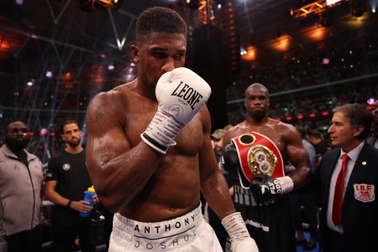 Anthony Joshua looks on after loosing to Daniel Dubois in their IBF World Heavyweight Title fight as part of the Riyadh Season - Wembley Edition card at Wembley Stadium on September 21, 2024 in London, England.