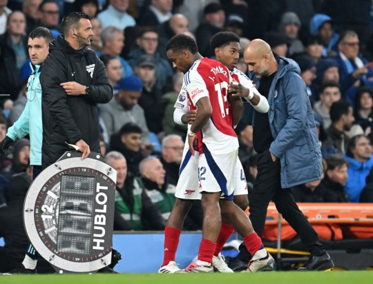 Lewis-Skelly being substituted on for arsenal in a game vs Man City.